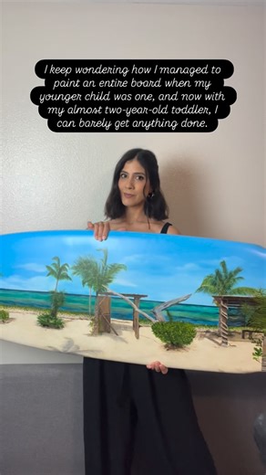 Isabelle Verona on Instagram: "Lately I’ve been feeling frustrated that I can’t finish anything… and then I look back and remember that even with a baby, I somehow managed to paint an entire surfboard. But then it hit me, he was a calm little baby who stayed in one place. Now he’s almost two, and he runs, jumps, climbs everything, and wants to explore every corner of the house. These days I can only paint when he’s sleeping and my older son is in school or also sleeping. It’s a different season 