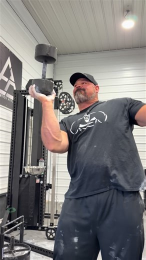Brian Shaw on Instagram: "GRIP STRENGTH LEVEL 💯 I tried this out with a full York 60lb roundhead dumbbell for the first time. Fun time playing around with some grip stuff when @nickguardione challenged me to this. A full YouTube video will be coming to my SHAWSTRENGTH YouTube channel soon. 💪 Tag someone who you think should try this 👀 #shawstrength #begreat"