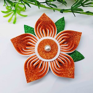 256K views · 19K reactions | Star flower making very easy instruction with eva glitter foam sheet from foamrian. Christmas tree decorating ideas with ornaments. #ChristmasOrnaments #AngelOrnaments #handmade | Origami Art & Crafts | Facebook