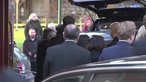 Status Quo and family members attend Rick Parfitt funeral