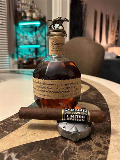 The Brandy-amber sweetness and vanilla notes of Blanton’s Bourbon pair with the Camacho 2025 Limited Edition cigar’s bold, peppery profile to create a balanced, complementary contrast. On the draw, cedar and cocoa from the cigar amplify Blanton’s caramel and oak, yielding a smoother sweetness that lingers into the finish. Slow, deliberate draws let the whiskey keep pace with the cigar’s evolving spice, resulting in a harmonious, nuanced pairing. In other words….THIS COMBO IS 🔥🔥🔥🔥🔥🔥🔥🔥🔥🔥