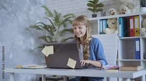 cute 10 years old girl is playing a computer game intently 4K