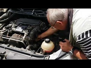 Remplacement du thermostat Peugeot 206 HDI.