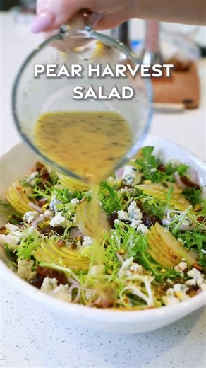 Having this pear salad on repeat for fall!! Crispy frisee lettuce combined with sweet pears, dates, pistachios, blue cheese, and a zesty vinaigrette! This seasonal fall salad is great with roasted chicken! I love it for Thanksgiving, too! Get all the recipe details on my website! https://tatyanaseverydayfood.com/frisee-pear-salad/ #pearsalad #whatsfordinner #salad #easyrecipes #fallrecipes #fallsalad #dinnerideas #eatwell #dinnertime #quickmeals #pear #pearrecipes #foodie #foodnetwork #bonappeti