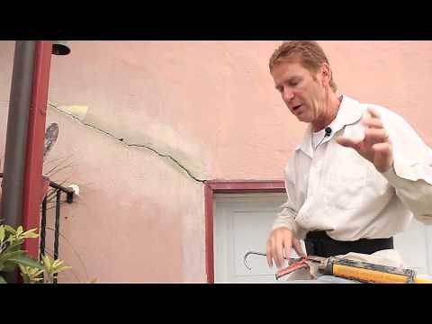 Repair cracks with Sikaflex caulking by adding sand.