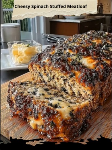 Cheesy Spinach-Stuffed Meatloaf Ingredients: 2 lbs ground beef 1 egg 1/2 cup breadcrumbs 1/4 cup grated parmesan 1 small onion, finely diced 2 cloves garlic, minced 1 tsp Italian seasoning Salt & pepper to taste 1 cup shredded mozzarella or provolone 1 cup cooked spinach, chopped Fresh parsley or chives (garnish) Instructions: 1. Preheat oven to 375°F (190°C). In a large bowl, mix ground beef, egg, breadcrumbs, parmesan, onion, garlic, seasoning, salt, and pepper. 2. Flatten the mixture into a r