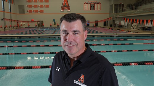Retiring coach Joe Fisher kept Ames swimming going strong