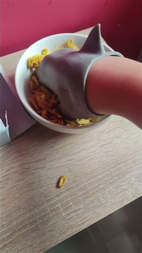 shark puppet eat Mac and cheese