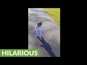 Baby terrified of her own shadow