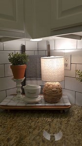 I've been kind of obsessed with mini lamps lately! They make the kitchen feel so cozy, especially after sunset. I much prefer them to the overhead lights; they're so peaceful. Sharing my favorite little corner of my kitchen–a few of my favorite things, including a mini lamp.♡ #craftylittlemarket #kitchen #kitchenlighting #kitchenlamp #minilamp #kitchencounterdecor #cozycottagestyle #cottagekitchen #cottagefarmhouse #terracottapots #whitekitchencabinets #cottageaesthetic #bhghome #homefinds #kitc