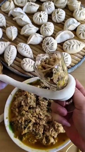 Fold and shape the dim sum dough, then fill it with seasoned ground chicken make the dimsum #shorts