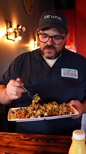 I’m at Naan-Tastic in Rochester (they’ve got locations in Buffalo too) trying out their Pataka Fries — think Indian-style loaded fries, and they are seriously good.They start with house-cut, twice-fried French fries, then load them up with sauces, fresh cilantro, red onion, crispy noodles, and I added lamb to mine — though you can top them with just about anything on the menu.I’m no expert on Indian cuisine, so I can’t name every spice, but these fries are packed with the bold, familiar flavors 