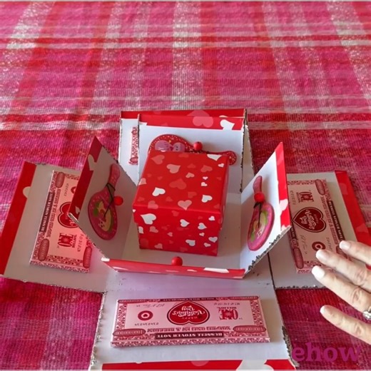 4.5K views | With layers of hidden treasures, this exploding Valentine's box will be a special gift that your Valentine will never forget! DIY: https://bit.ly/40RTUq0 | ehow | Facebook