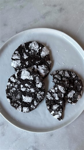 Chelsea | CookWithChel on Instagram: "Chocolate Crinkle Cookies Rich, dark, and deeply chocolatey, these crinkle cookies have a soft, chewy center and crisp, crackly tops. Extra-dark chocolate plus a touch of espresso and vanilla intensify the cocoa flavor, while brown sugar keeps them perfectly fudgy. Makes about 2 dozen Ingredients ⅔ cup extra-dark chocolate chips (at least 60% cacao) 4 tablespoons butter 1¼ cups packed brown sugar 3 eggs, room temperature 1 tablespoon espresso powder (optiona