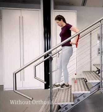 Woman with paralyzed leg on crutches.