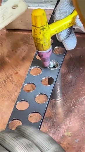 fusing various metal parts using precise tig and laser tools on a workshop table