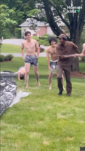 Watch UPS Driver beat the heat by joining Slip 'N Slide party!