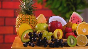 Fresh sliced fruit placed on a table - Free Stock Video