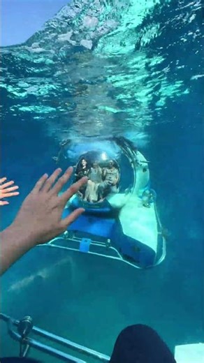 In Sanya, Hainan, one can witness another world beneath the sea. The sleek submarines are truly cool