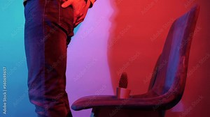 Men Suffering from Hemorrhoid Pain sitting on cactus chair in studio lights