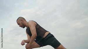 LGBT Queer Gay Man Male Warming Up Exercise on the Beach - Body Movement, Stretching, Jogging, Push Ups and Skipping