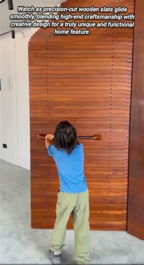 Stunning Modern Kinetic Wooden Slat Door Design For Interiors
