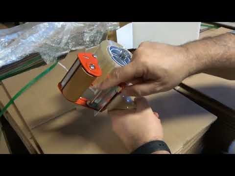 Loading a Tach-It pistol grip tape gun