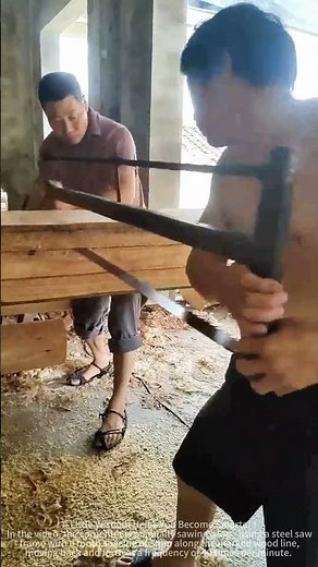 The process of workers pulling logs by hand to process them into planks.