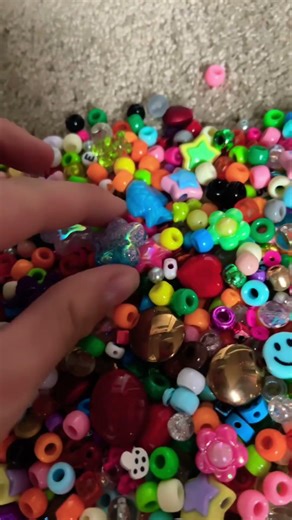 Day one of making random things with this bucket full of beads #beads #kandi #bracelet #cool