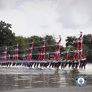Making a spectacular splash, this enormous human waterskiing pyramid involved 80 people - The Mercury Marine Pyramid - in Janesville, Wisconsin, USA 💦 | Guinness World Records