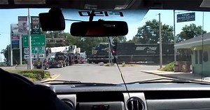 Amateur Footage Shows Train Crashing Into 18-Wheeler Stuck on Tracks
