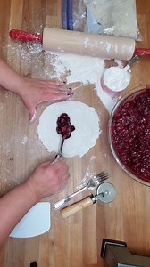 Making blackberry hand pies. Use fresh or frozen blackberries for the pie filling and homemade pie crust or biscuit dough. Hand Pies can be frozen on half sheet pans. #blackberrypie #pie #handpies #baking #homestead | A Farmgirl's Kitchen