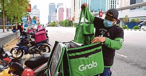 NWP Holdings ventures into motorcycles purchase programme for Grab Food rider | New Straits Times
