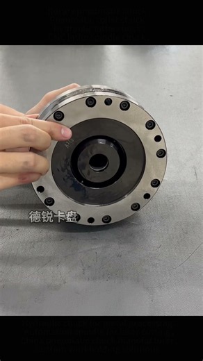 Pneumatic rotary chuck; workpiece clamping repeatability of 0.03 mm.