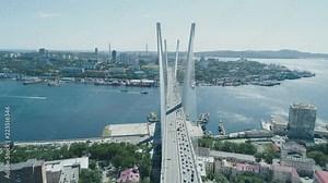 Aerial drone view of The Zolotoy Golden Bridge. Cable-stayed bridge across the Zolotoy Rog (Golden Horn) in Vladivostok, Russia