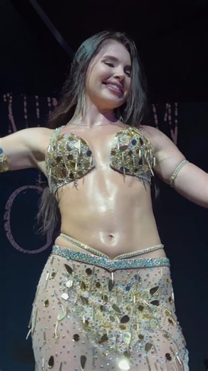 ‏"Dive into the mesmerizing world of belly dance, where each movement i...