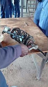 How to remove shock absorber absorber using spring compressor tool #shockabsorber #suspension
