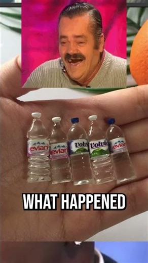 Shaq drinking water -- he has the BIGGEST HANDS!