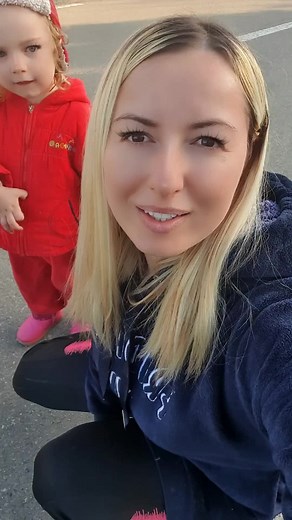 Blonde Individual in Outdoor Setting with Pet