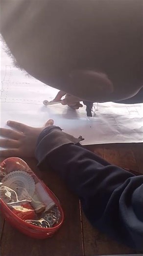 Tracing of pattern using tracing wheel and carbon paper