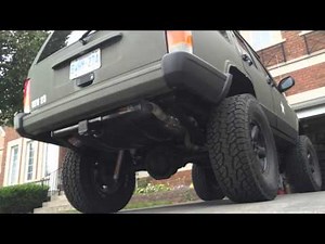 Jeep Cherokee XJ with thrush glasspack muffler.