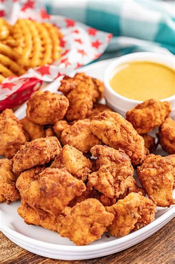 Crispy, juicy, and spot-on tasty. These copycat Chick-fil-A nuggets bring the drive-thru favorite straight to your kitchen. https://thestayathomechef.com/chick-fil-a-nuggets/ | The Stay At Home Chef