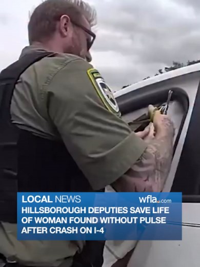 SAVING LIVES: Hillsborough County deputies rescued a woman found unconscious and without a pulse after she was involved in a crash on I-4, according to the sheriff's office. Read more in the link attached to this video. #news #florida #hillsboroughcounty #bodycam