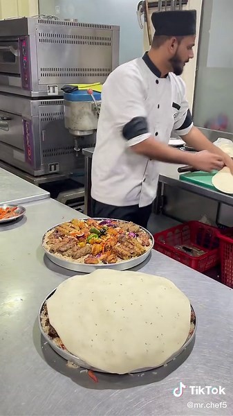 Chef Prepares Delicious Dishes in Commercial Kitchen