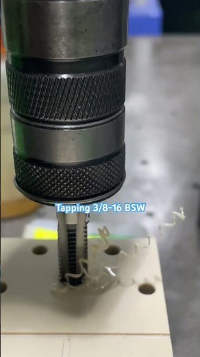 “Tapping 3/8-16 BSW — cutting clean threads down to 10 mm deep.”