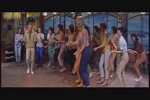 "Lot of Livin'" dance scene from "Bye Bye Birdie" 1963 Bye Bye Birdie is a 1963 American musical comedy film based on the stage production of the same name. The screenplay was adapted from Michael Stewart's book for the musical by Irving Brecher, with music by Charles Strouse and lyrics by Lee Adams. Directed by George Sidney. The film stars Dick Van Dyke in his feature film debut, reprising his Broadway role as Albert Peterson, along with Maureen Stapleton as Mae Peterson, Janet Leigh as Rosie 