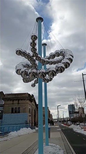 sculpture looking like DNA helix between Cherry Street Pier and Race Street Pier