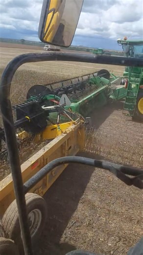 Combine harvesters are racing each other.