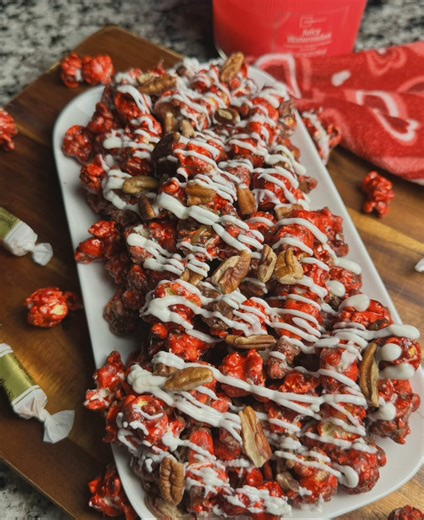 Gourmet Red Velvet Turtle Popcorn Recipe❤️ Bringing this delicious, easy-to-make, gourmet candied popcorn back for vday this year. Red velvet candied popcorn, drizzled in white & milk chocolate and caramel, topped with chopped pecans. Red Velvet Turtle Popcorn⬇️ 6-7 cup air-popped popcorn (or microwave popcorn) 1/2 cup unsalted butter 1/2 granulated white sugar 1/2 cup light corn syrup 1 tablespoon Red Velvet Emulsion 1/2 cup chopped pecans * ﻿Melted white & milk chocolate for drizzling Melted c