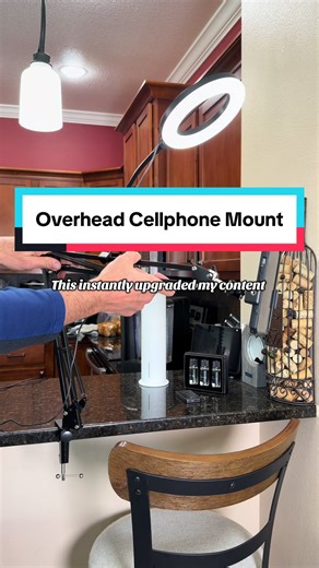 If you’re creating content for TikTok Shop, angles and lighting matter more than you think. This overhead cellphone mount with a built-in ring light makes filming so much easier. It clamps to your desk, rotates 360°, and lets you film clean overhead shots without juggling tripods or stacks of books. Perfect for flat lays, unboxings, packing videos, demos, and hands-only content. If you want your videos to look intentional, stable, and well-lit, this setup does the work for you. Tap the cart whil